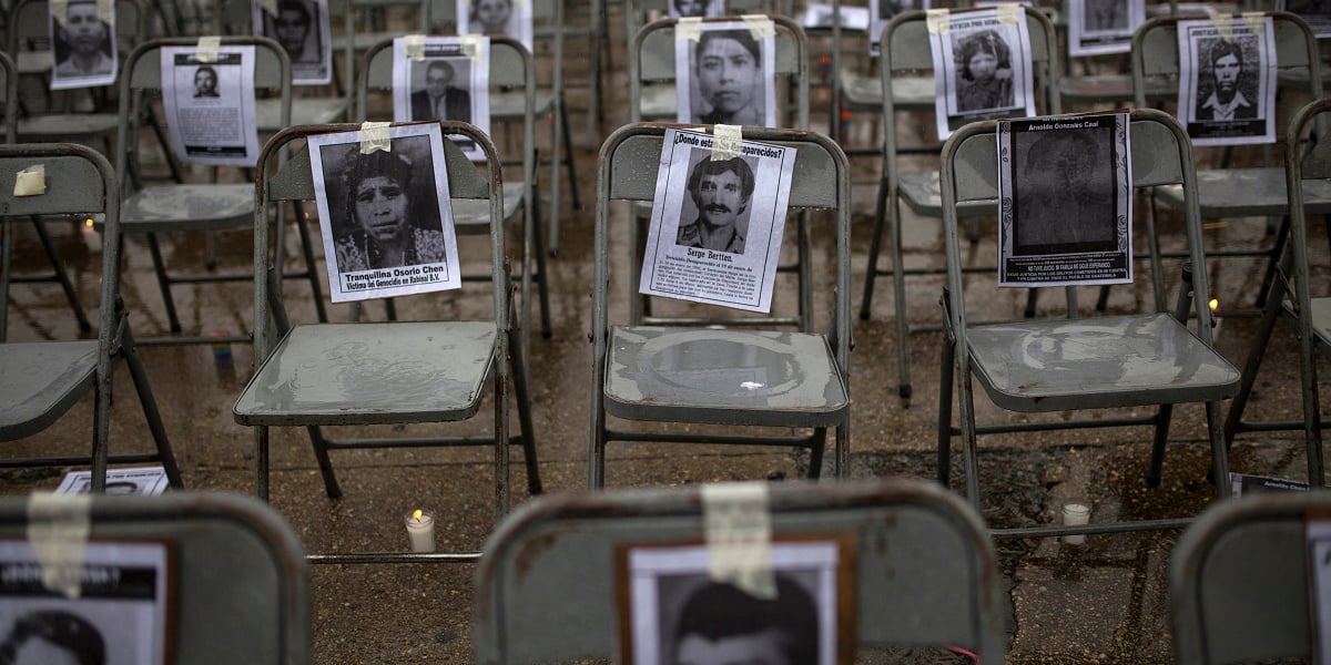  Reflecting on the importance of psychosocial support for families missing loved ones - image: chairs bearing portraits of people who were dissapeared in Guatemala, Credit: Castillo,M/Keystone