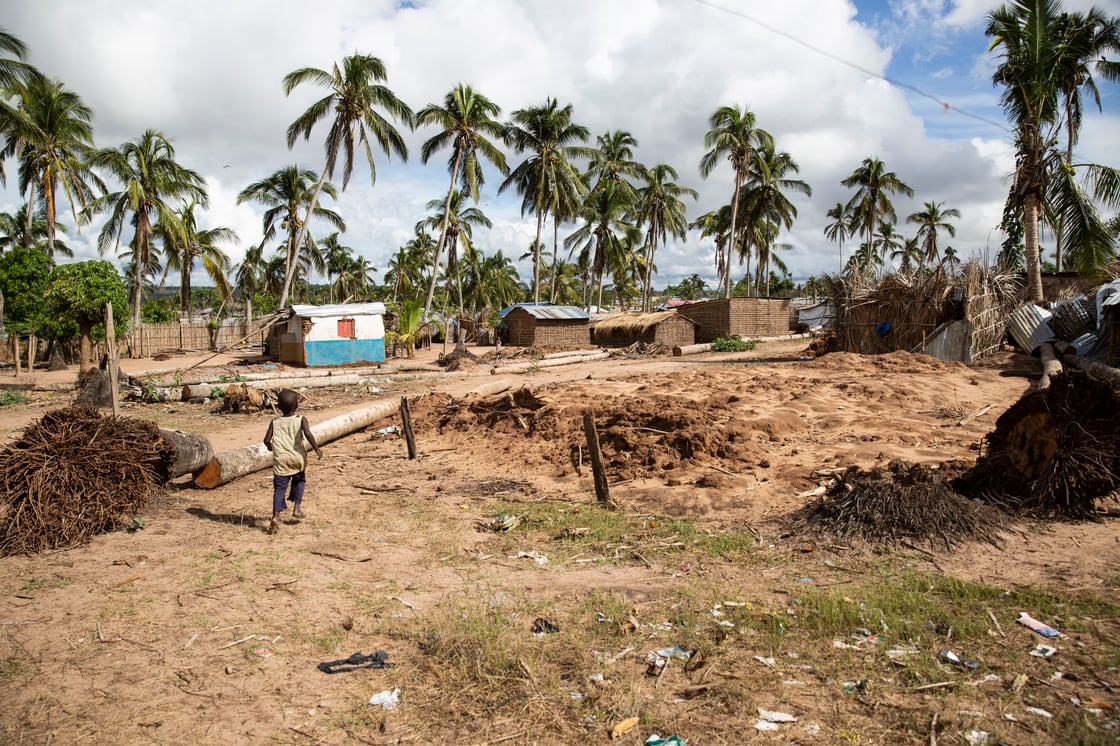 Cabo Delgado Province, Macomia. A child runs through the ruins of a home that was destroyed in Cyclone Kenneth in April 2019.